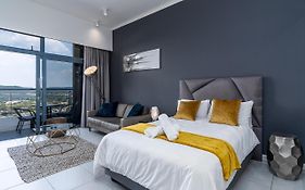 Top Floor Menlyn Maine Studio Apartment With Stunning Views & No Load Shedding